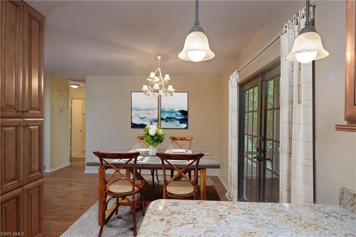 Photo includes reality renovation and/or staging to showcase the possibility of the dining area. Design services included with purchase!