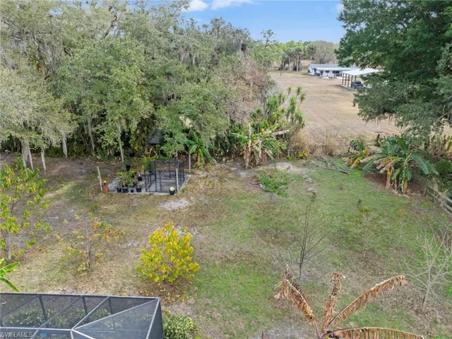 View of yard with view of scattered trees