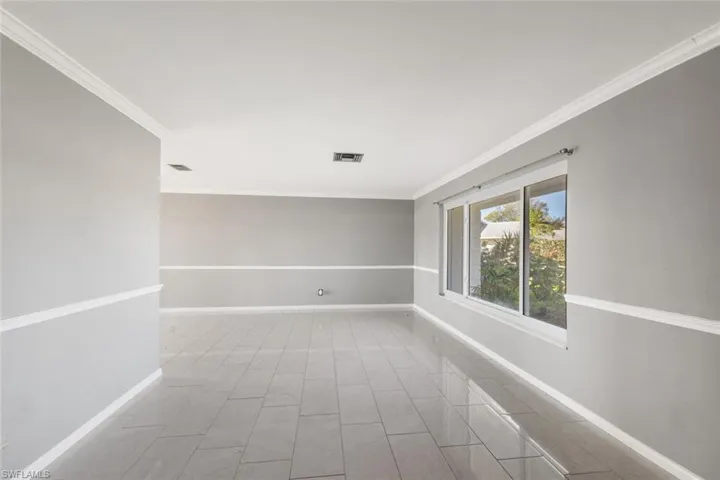 Sunny living room with large picture window