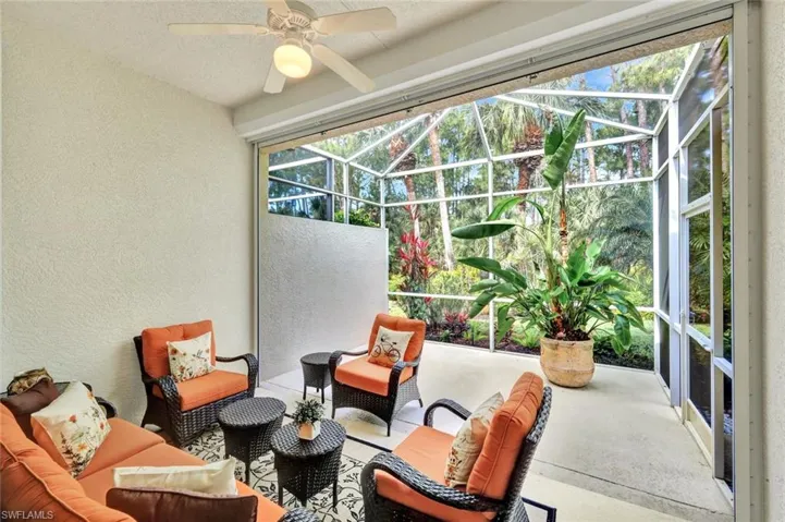 Back screened lanai with quiet preserve view.