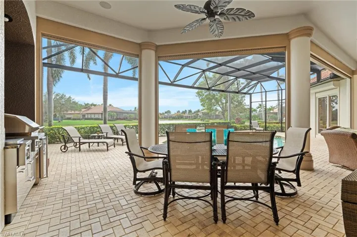 Sunroom featuring ceiling fan