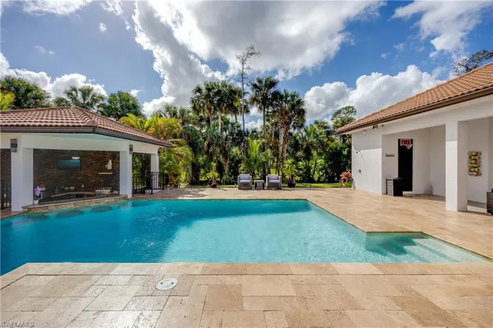 Swimming pool with a patio area