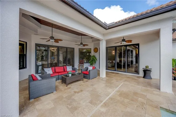 View of patio featuring a ceiling fan and outdoor lounge area