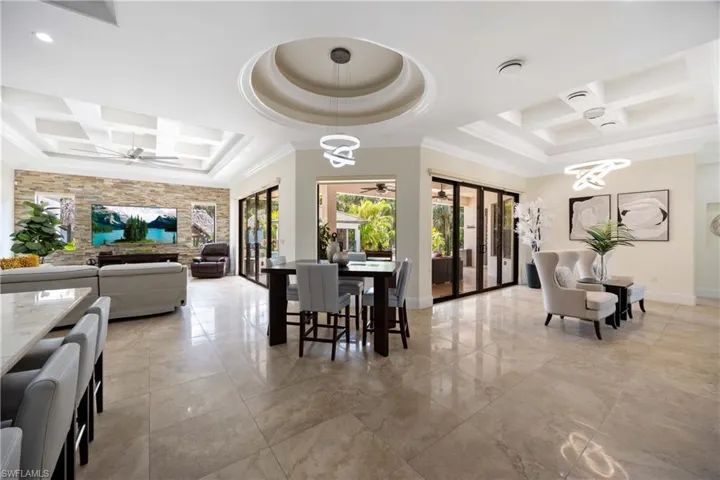Lobby featuring coffered ceiling and beamed ceiling
