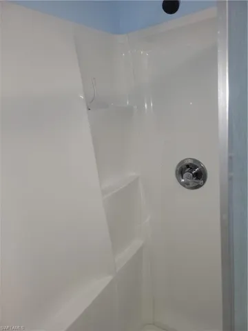 Walk in shower in primary bathroom.
