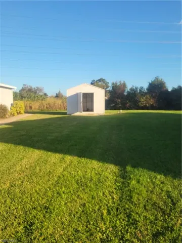 Large yard w/shed.