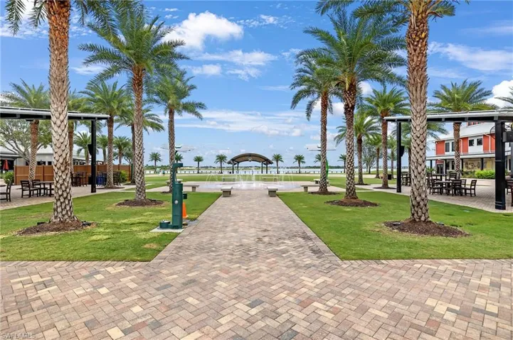 View of property's community with a yard and a gazebo