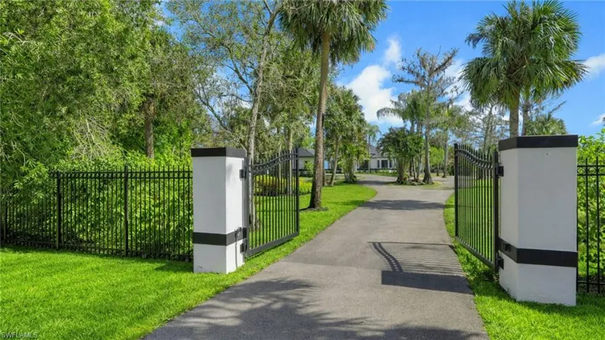 Virtually Staged Surrounding community featuring a gate