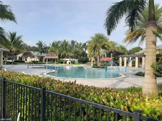 Community pool featuring a patio area