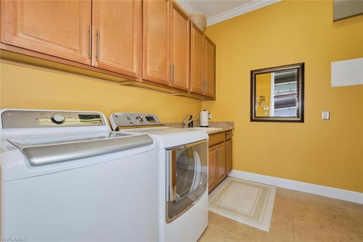 Laundry room with LOTS of storage!