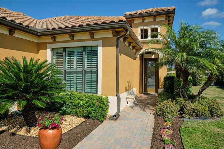 Stunning front walkway. Hurricane impact windows throughout with electric storm shutters on the back sliders and front door.