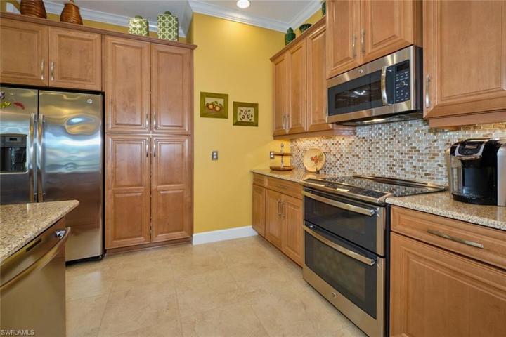 Gourmet kitchen with upgraded appliances.
