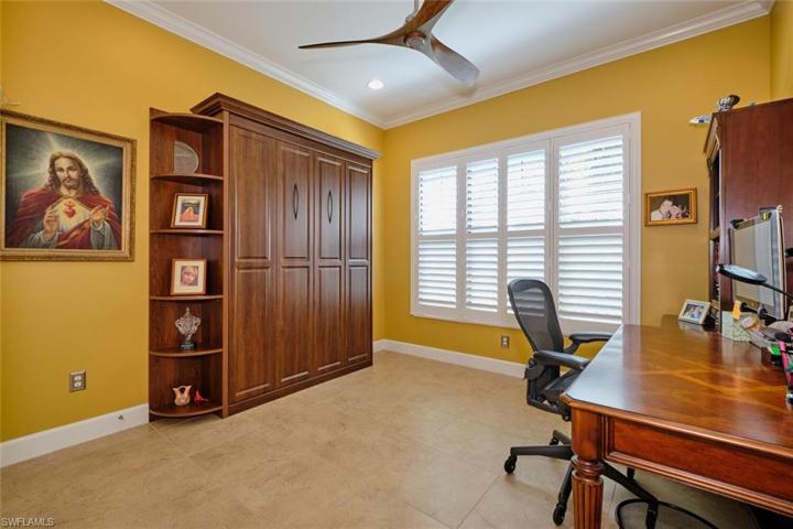 Bedroom / Den. You can have it all with this custom Murphy bed. And the plantation shutters, beautiful!