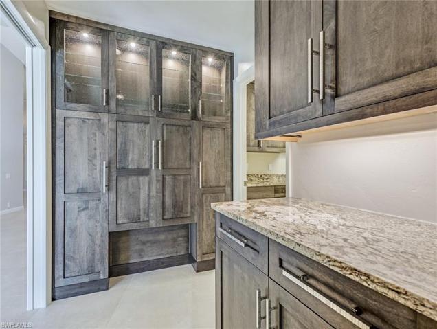 Custom Storage between Kitchen & Laundry
