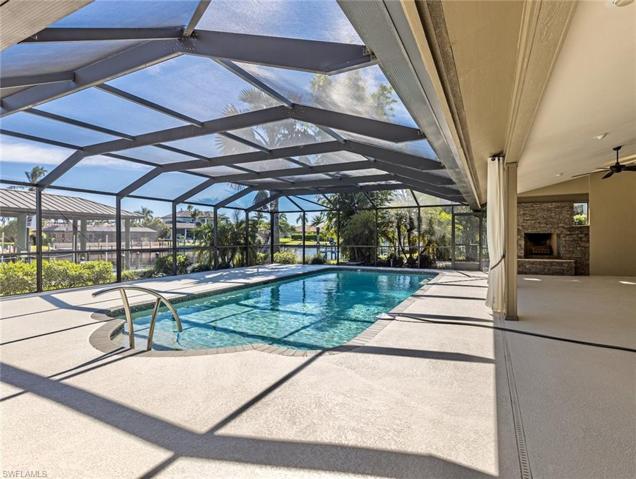 Covered Lanai, Fireplace, and Pool