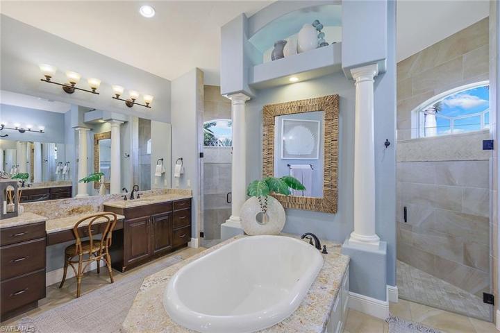 Luxury Spa Bath for Two! Separate Sink Areas, Soaking Tub, Glass Walk In Shower with 2 Showers