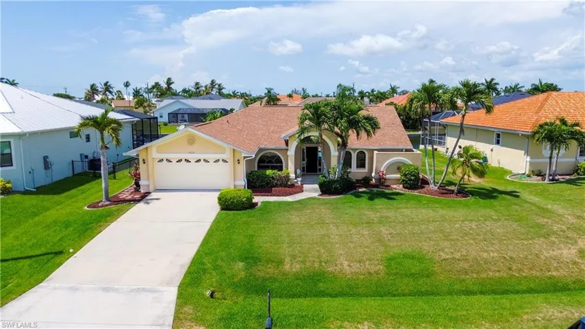 View of front of property with a front yard
