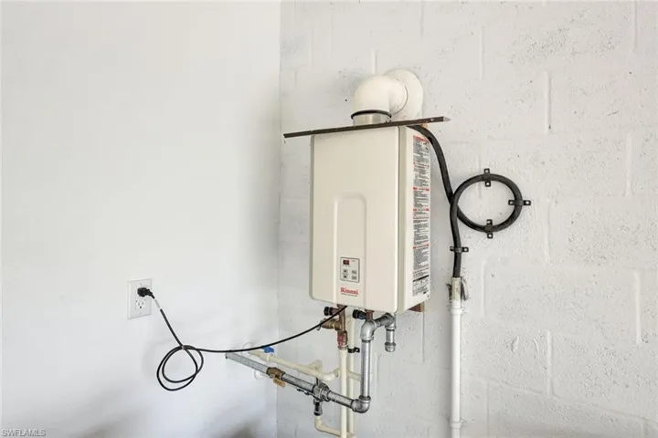 Detailed view of concrete block wall and water heater