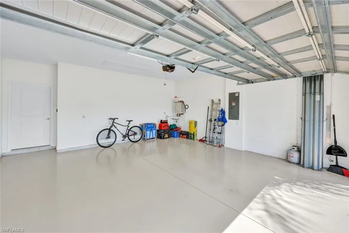 Garage featuring electric panel