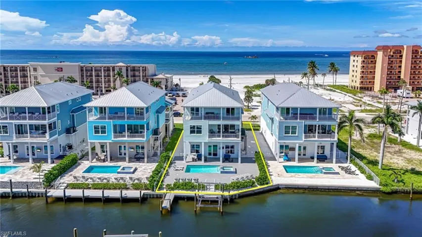 Drone / aerial view of expansive coastline and a pool - Virtually Edited Image