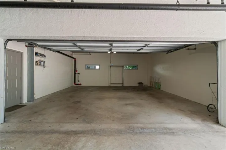 Two car garage with a side entry door