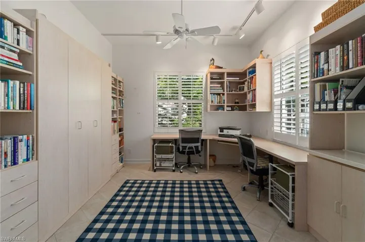 Another guest bedroom with 2 closets and a Murphy bed if needed. Plus added desk area if work calls