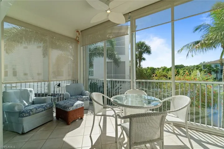 Relaxing breezy lanai with a fabulous lake and fountain view. Everything you desire in sunny Naples