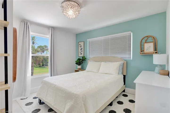 Bedroom featuring baseboards