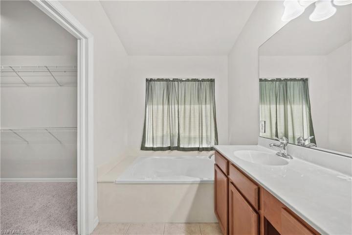 Primary Bathroom with Separate Tub and Shower