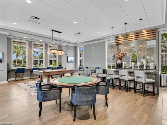 a built-in bar with pool table