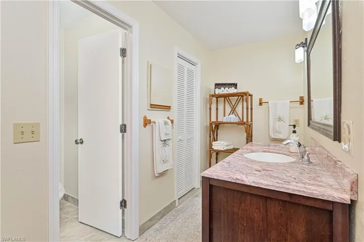 Bathroom with vanity and tile patterned flooring