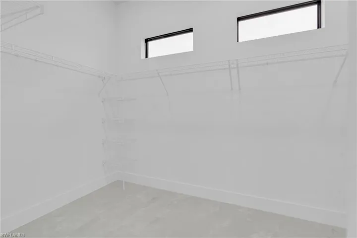View of Primary huge   walk in closet