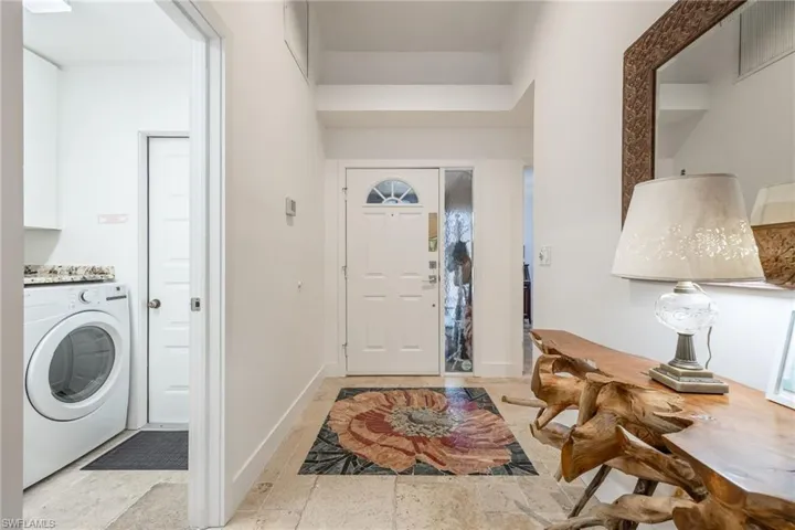 Foyer entrance with custom mosaic tile detail
