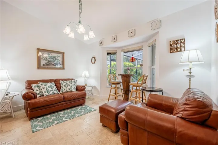 Living room with a notable chandelier