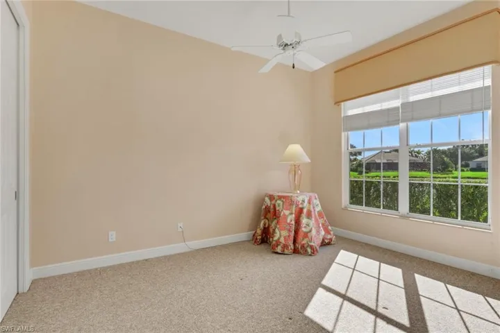 Rec room featuring carpet floors and a ceiling fan