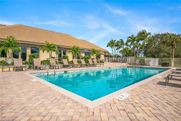 Community pool with a patio area