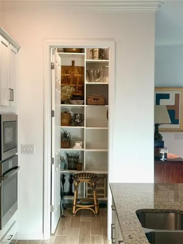 Storage area featuring a sink