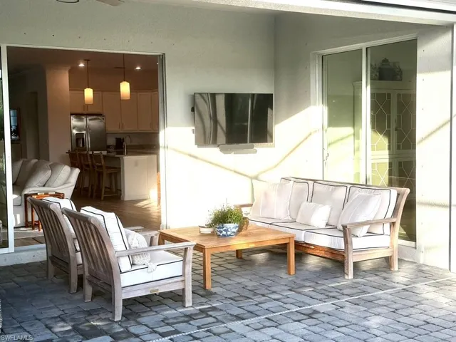 View of patio featuring an outdoor hangout area