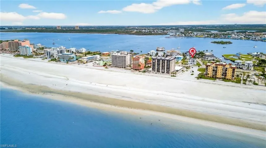 View of urban area featuring a large body of water - Virtually Edited Image