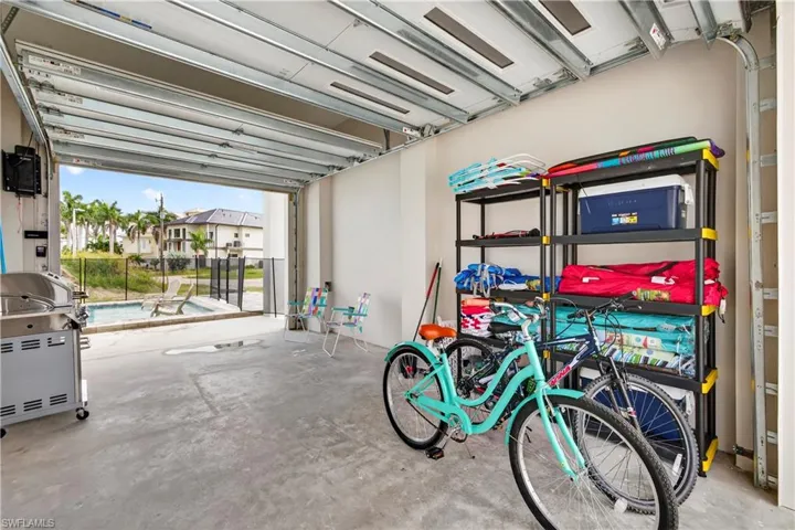 Garage with an outdoor pool - Virtually Edited Image