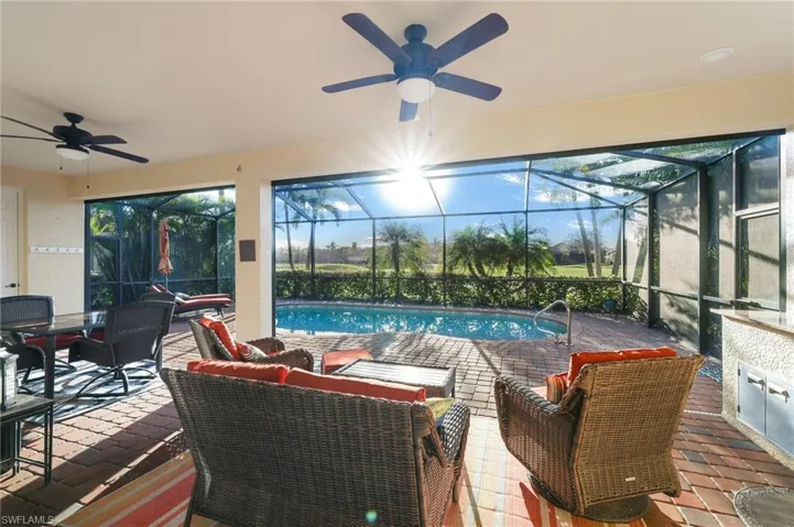 Spacious Lanai and Built-In Outdoor Grill and Automatic Rolldown Storm Screen