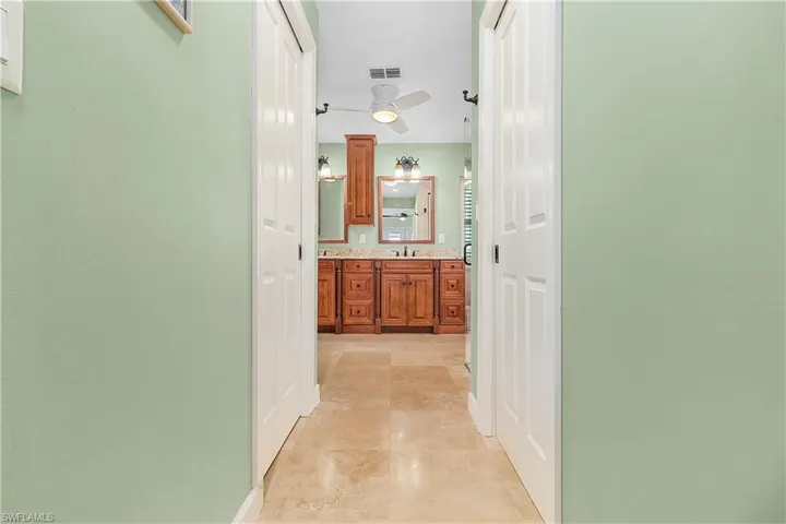 Primary bathroom with TWO walk in closets