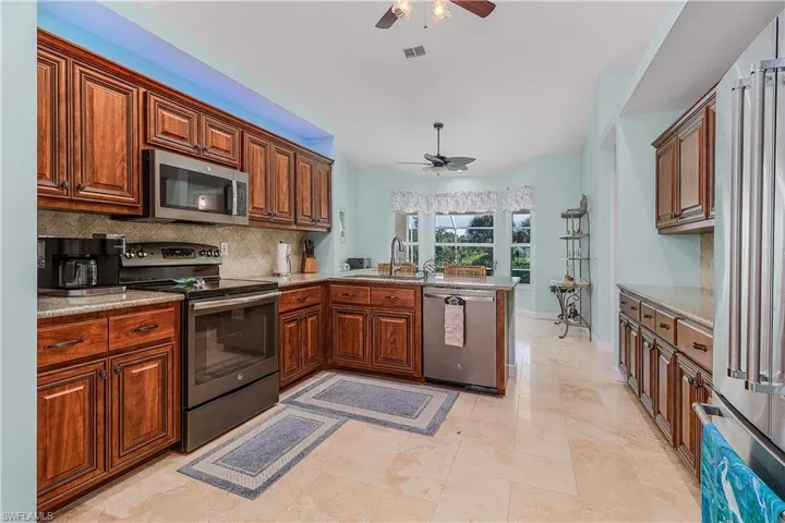 Kitchen with granite counters and plenty of cabinets-new appliances