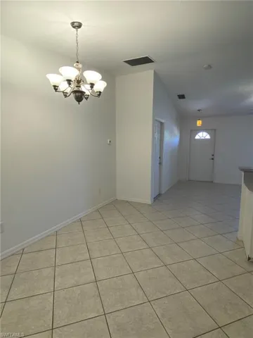 Spacious dining area adjacent to Kitchen