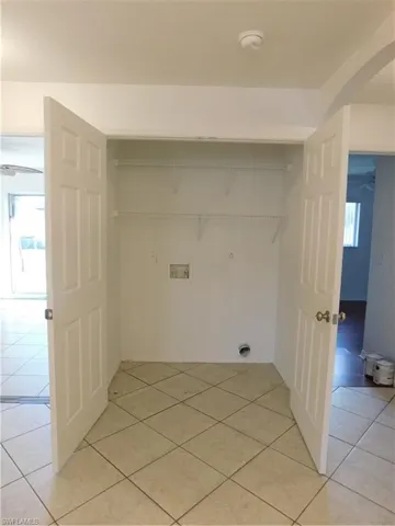 Large interior laundry closet fits full sized washer/dryer with additional storage shelving. Large Laundry closet fits full size washer/dryer and has additional storage shelving.