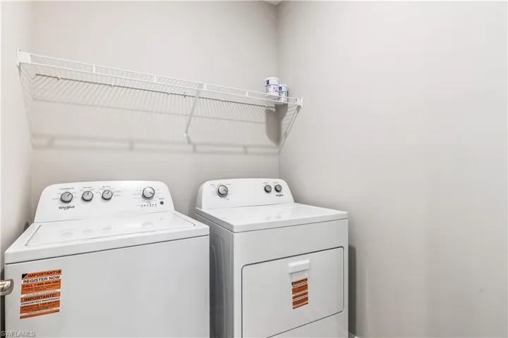 Laundry room featuring washer and dryer