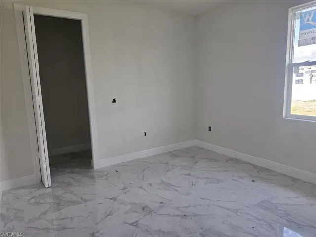 View of tiled empty room