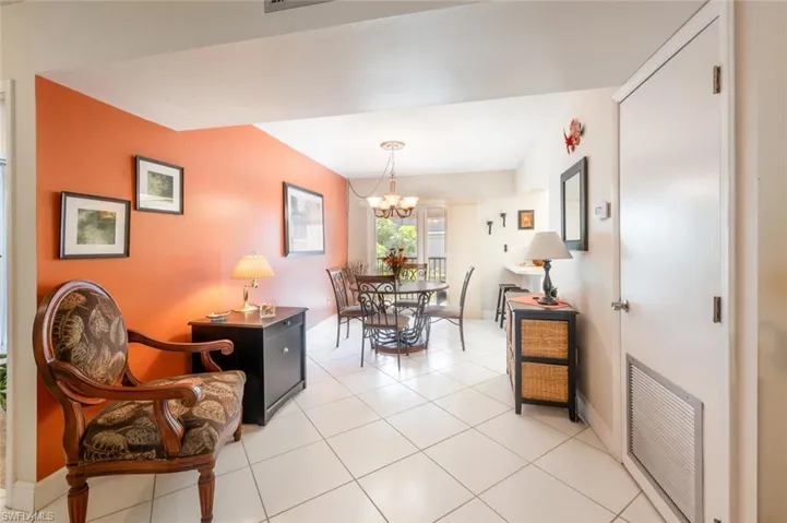 Enetering towards dinng area from living room. Table by chair becomes a nice desk!