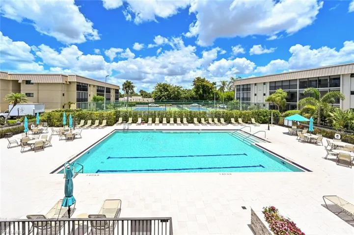 Huge heated pool, with lap lanes, many deck lounge areas.  Look out to tennis and pickleball courts.