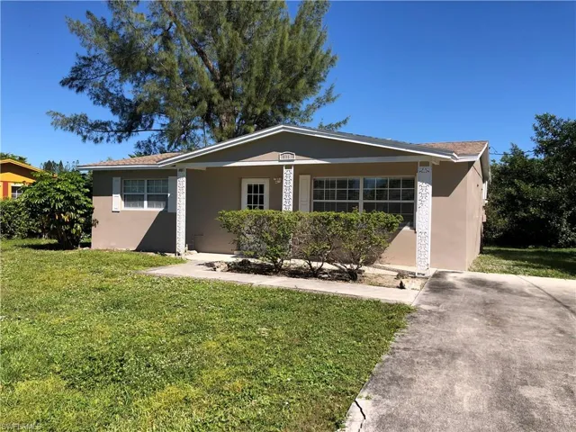 Exterior, driveway, and front yard